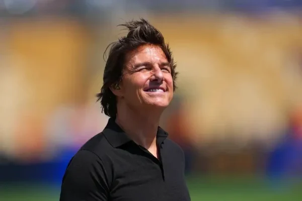 Still sporting abs at 64, Tom Cruise admits to being “overly passionate about work.”